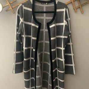 Long gray and white patterned sweater